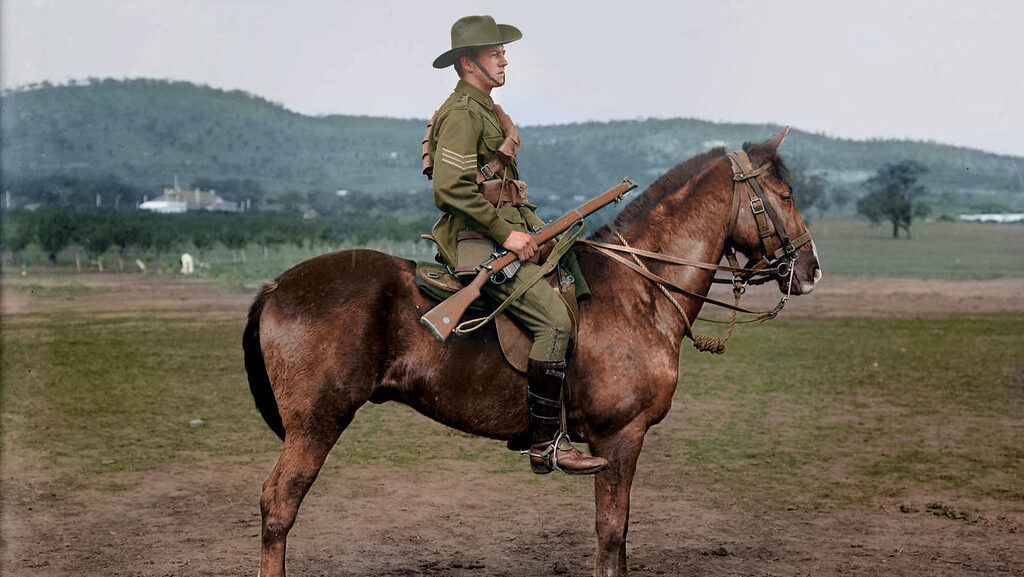 the warrior is sitting on the brown horse