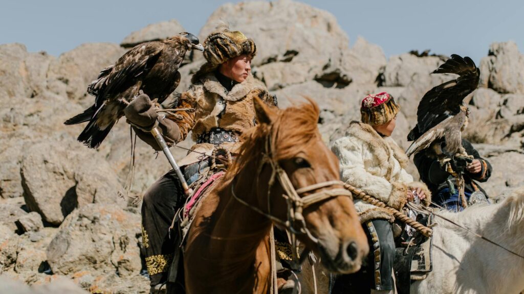 hunters riding horses