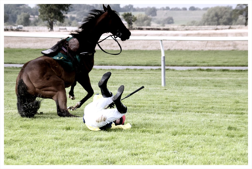 Horse and jockey tumble