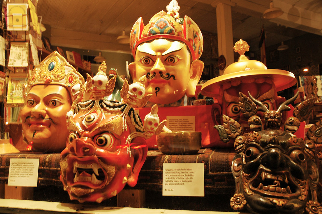Tibetan Hayagriva mask with Padmasambhava mask in window display