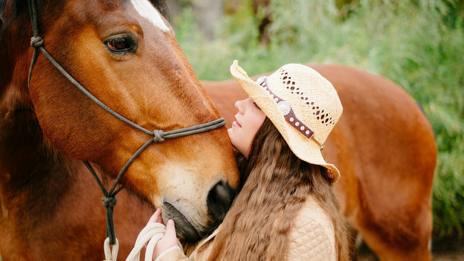woman beside horse