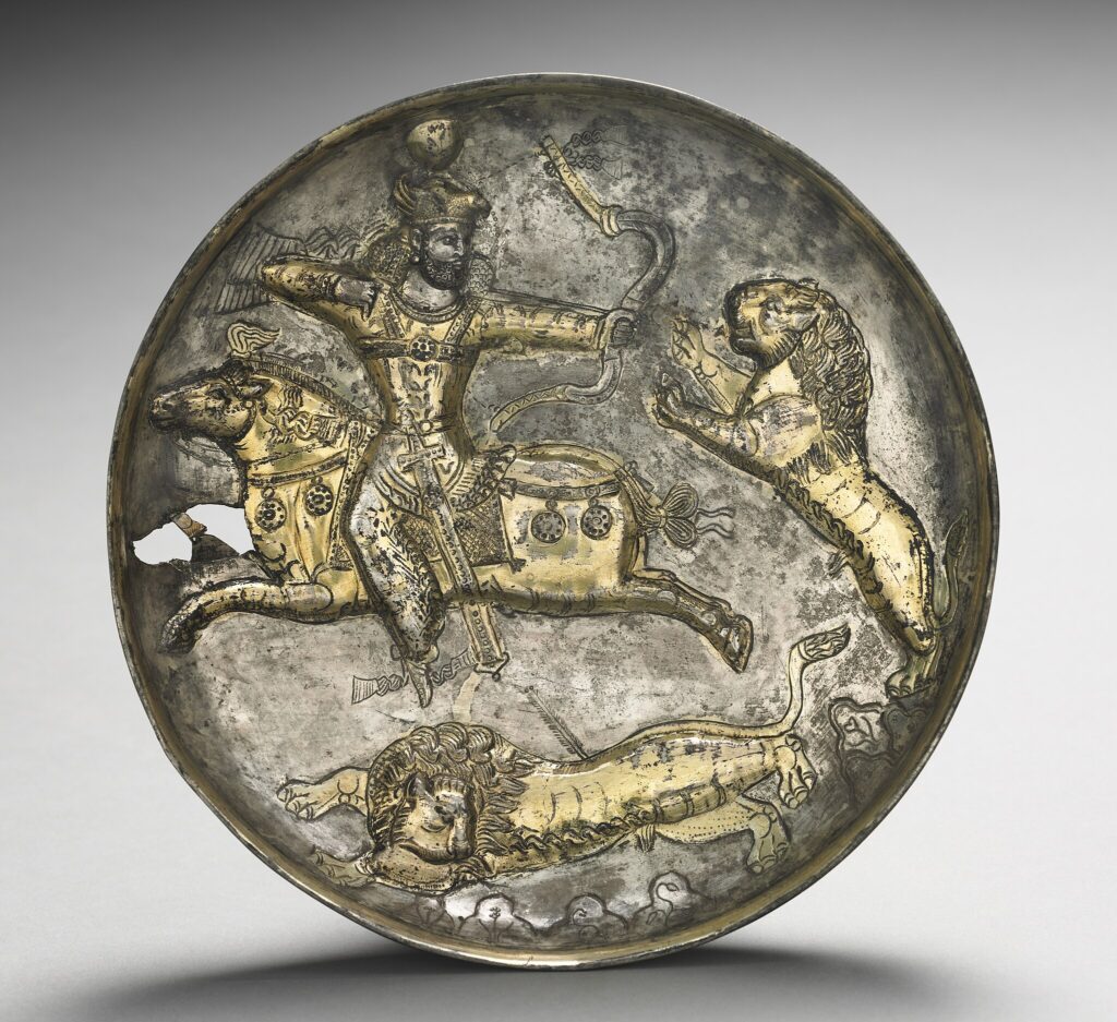 The Persian king Hormizd II hunts a lion by a Parthian shot.