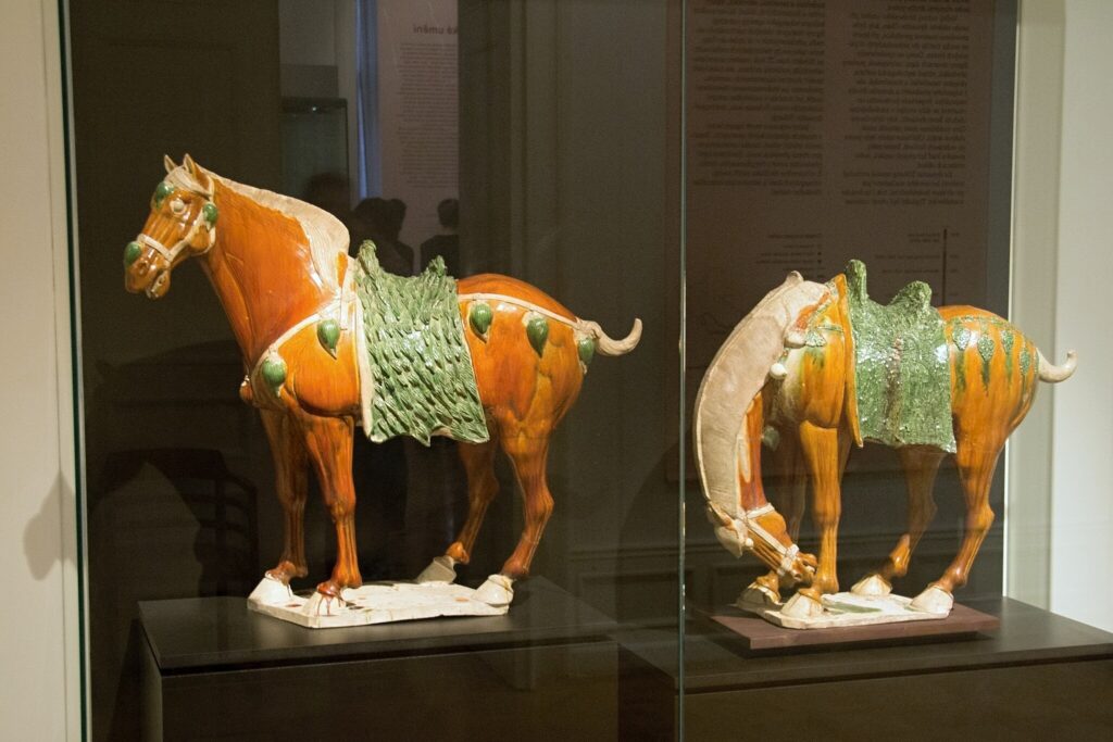 Standing Fergana horse. China, Tchang dynasty, early 8th century AD. Glazed earthenware. Prague, NG Vp 129. Fergana horse on pasture. China, Tchang dynasty. Glazed earthenware. Prague, NG Vp 4128.