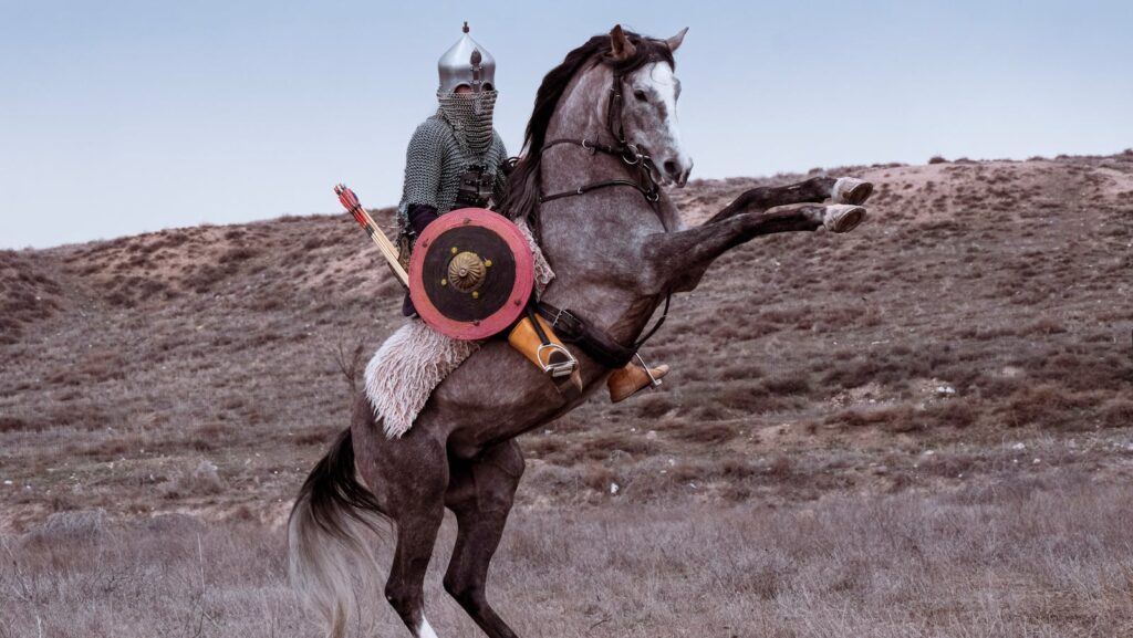 A historical reenactment featuring a warrior on horseback in Konya, Türkiye.