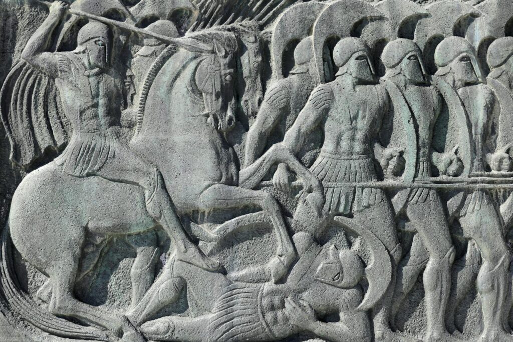Intricate stone relief depicting an ancient Greek battle scene Greece