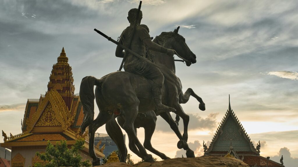 a statue of a man riding a horse