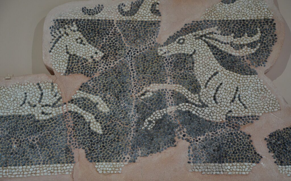 Fragment of a pebble mosaic floor depicting a horse and a stag, from Ancient Sikyon, 4th century BC, Archaeological Museum of Sikyon, Greece