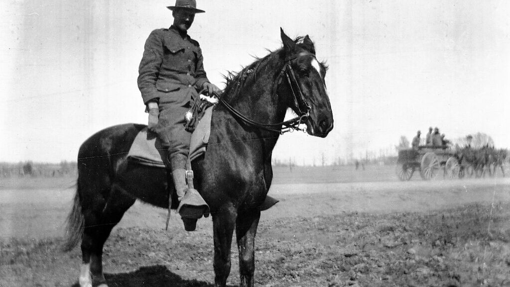 military man on riding a horse