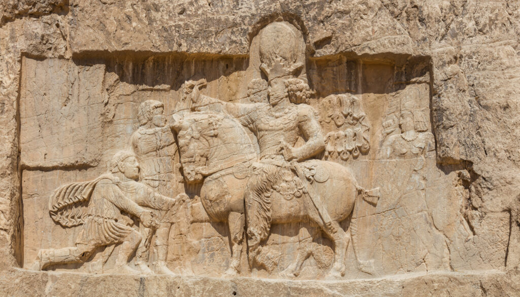 Horse kneeling sculpture