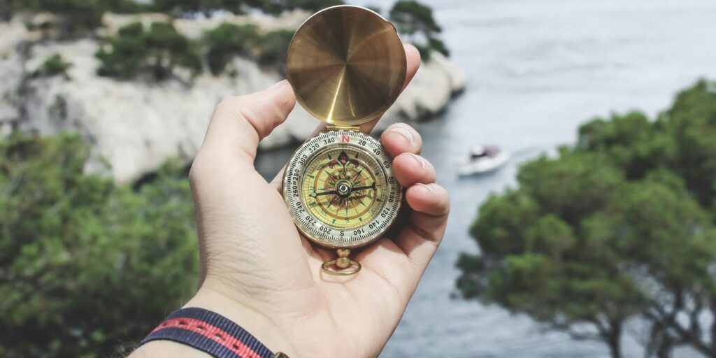 Explore the scenic coast of Cassis with a compass in hand, perfect for adventure seekers.