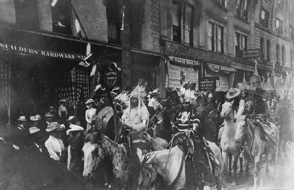 Native Americans in parade on First Avenue, 1902
