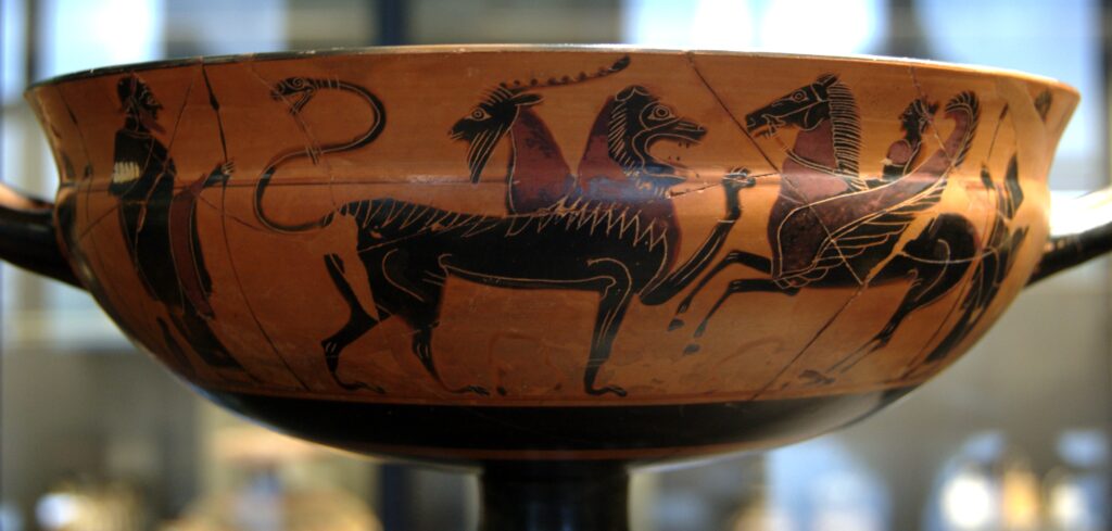 Bellerophon fighting the Chimera. Side A of an attic black-figured “overlap” Siana cup, ca. 575–550 BC. Found in Camiros (Rhodes).
