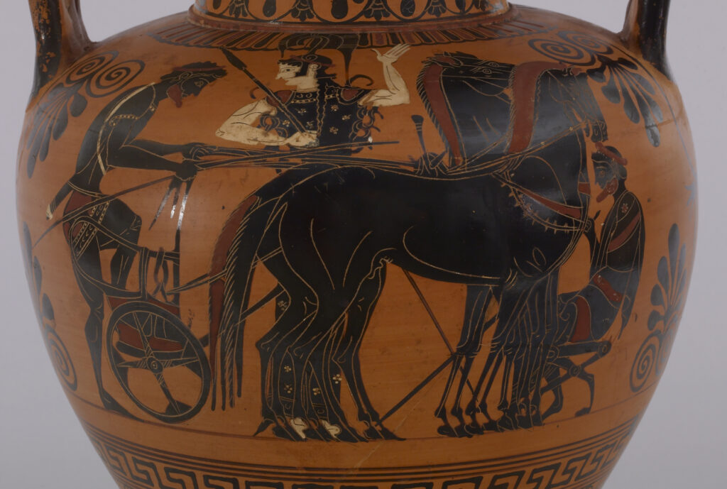 On one side of this black-figure amphora, a bearded man in a short chiton is mounting a chariot while grasping the reins of four horses. between 530 and 520 BC