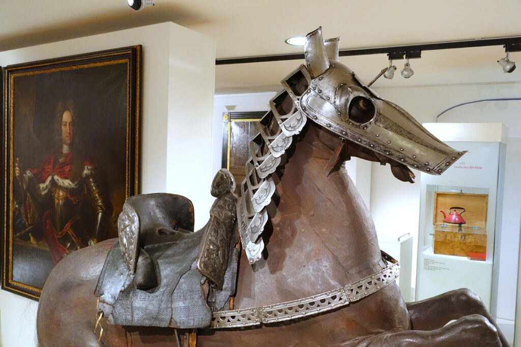 Horse armor with saddle, possibly from Braunschweig, 1542 AD, made of iron, leather, and wood