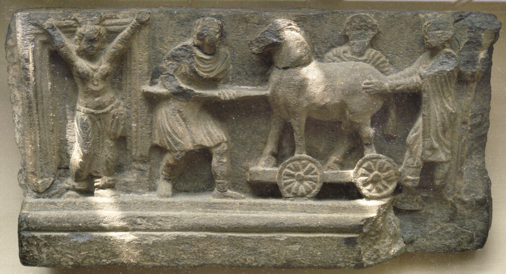 Depiction of the story of the Trojan horse in the art of Gandhara. British Museum