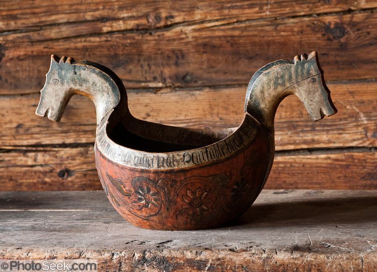 Medieval wooden bowl with horse head handles for two-fisted drinkers, from Hardanger Folk Museum, Utne, Norway