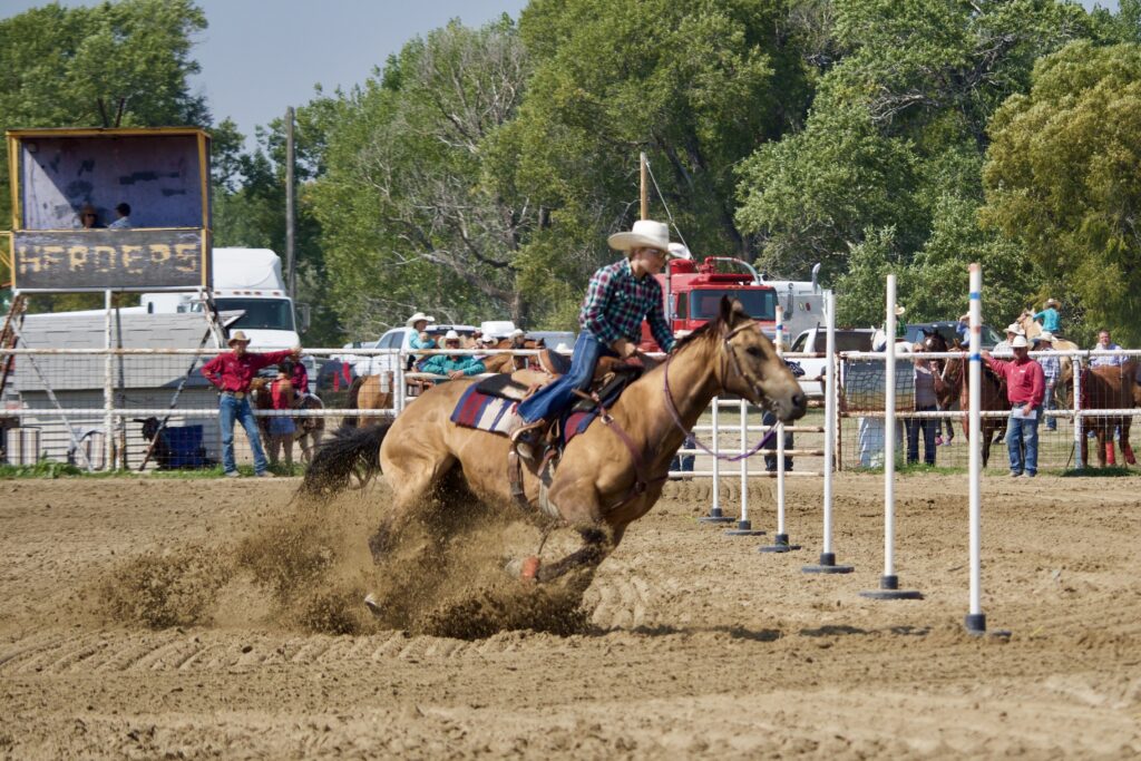 Rider competing in a pole bending event in Wyoming