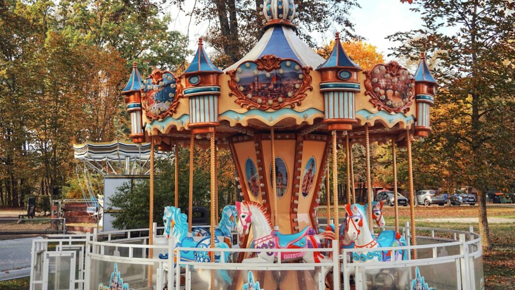 A merry go round in the middle of a park