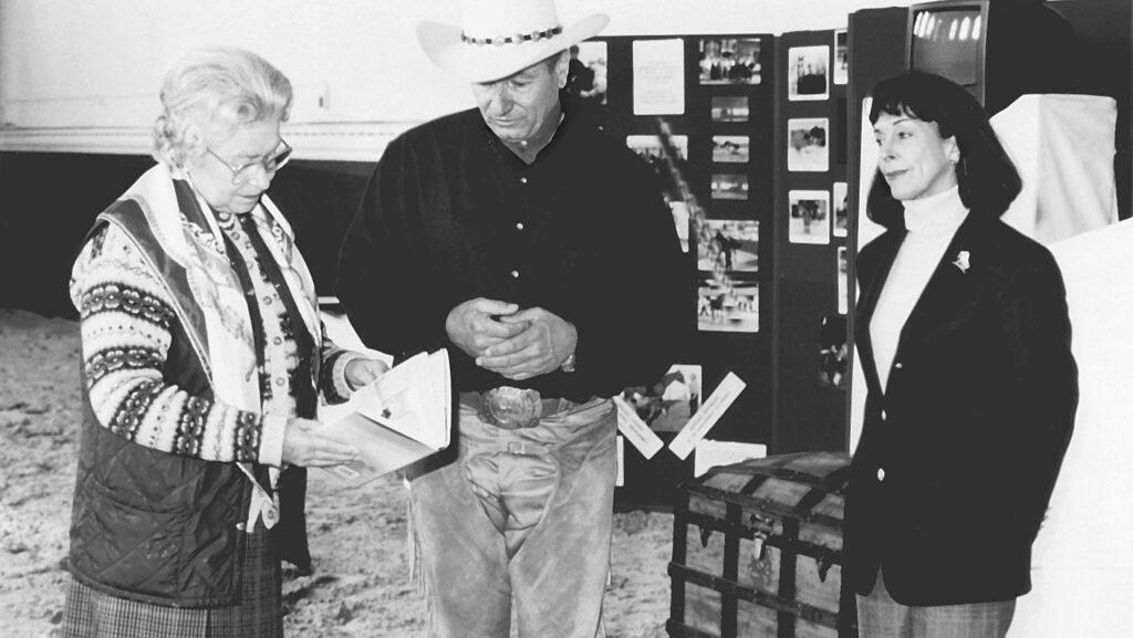 people standing in liberary