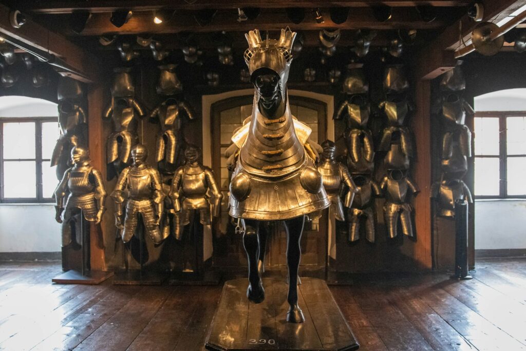 A statue of a horse in a room with wooden floors