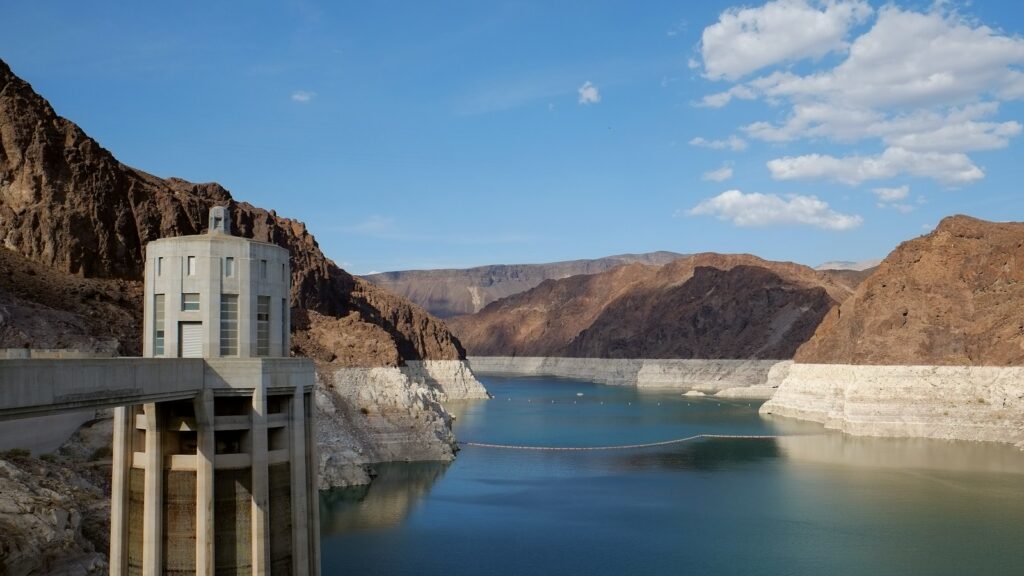 body of water near mountains