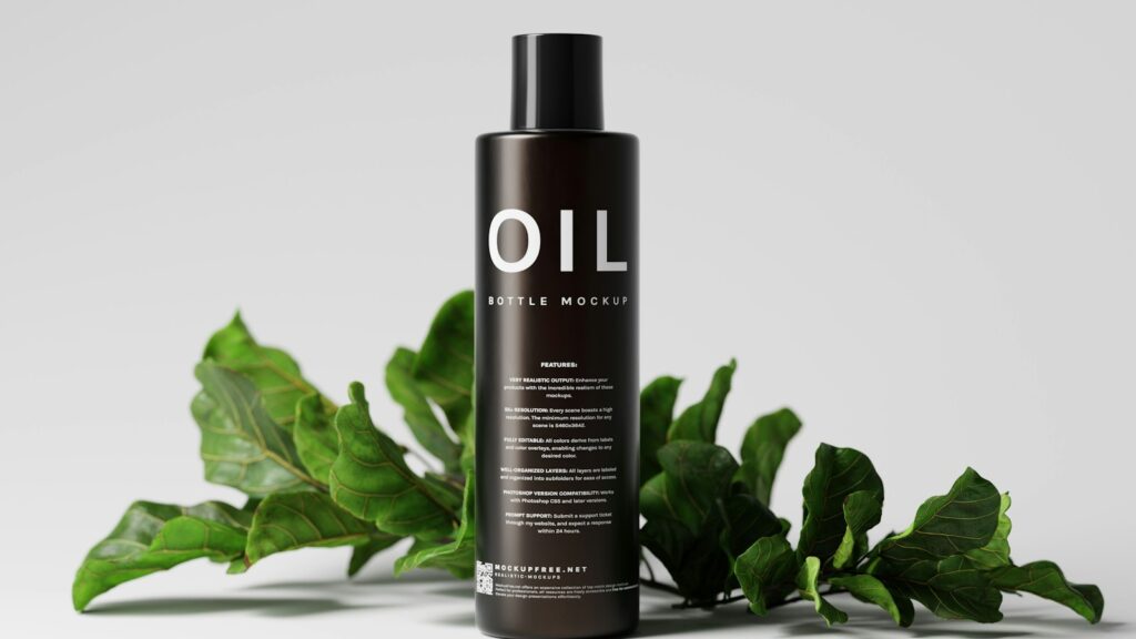 a bottle of oil sitting next to a plant