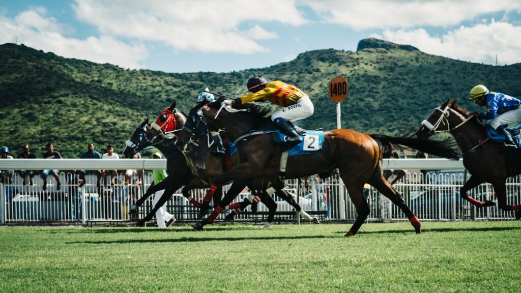 A man riding horse in race