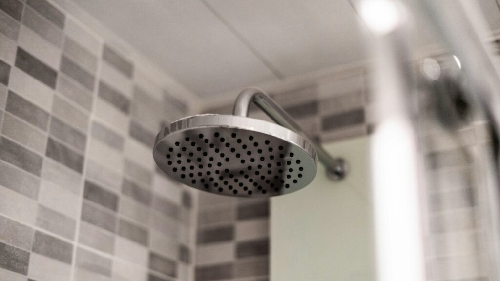 grey stainless steel shower head