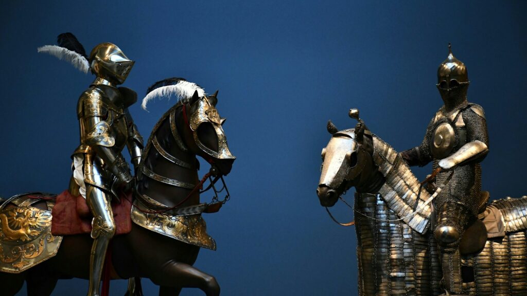 a group of statues of men on horses