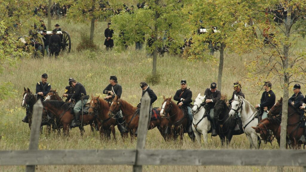 lined people riding horse