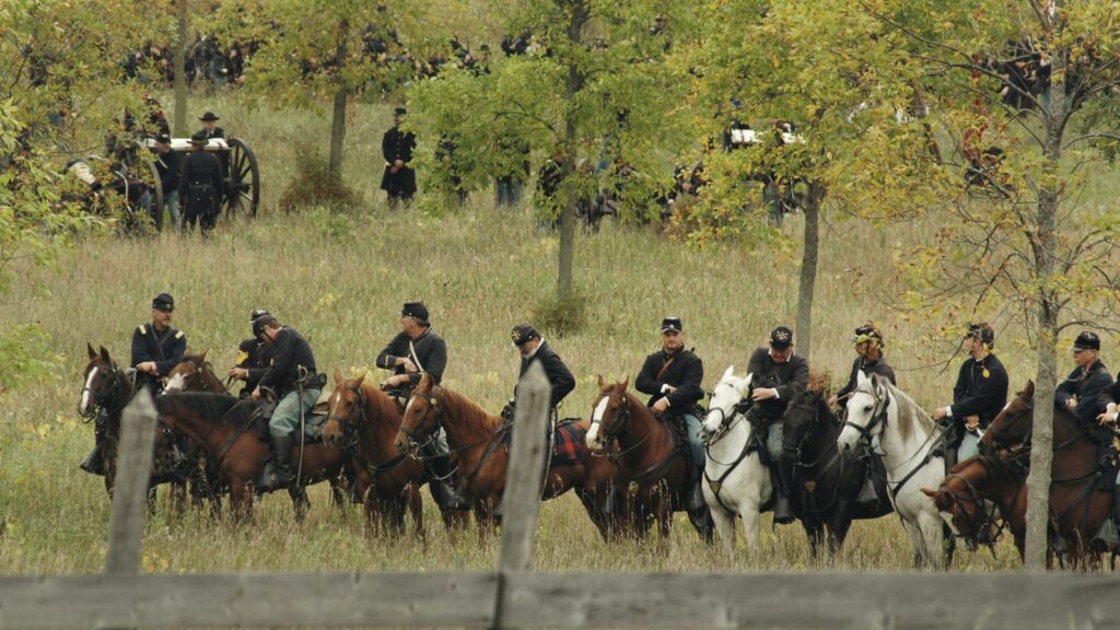 lined people riding horse