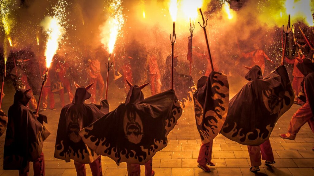 people holding fire crackers