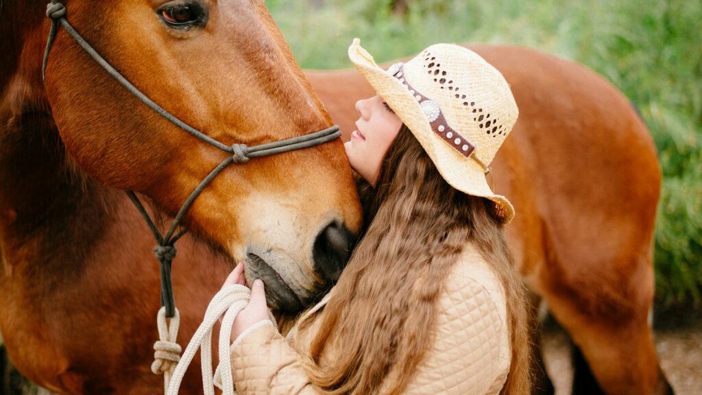 woman beside horse