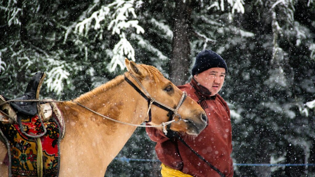 brown horse and a fat man