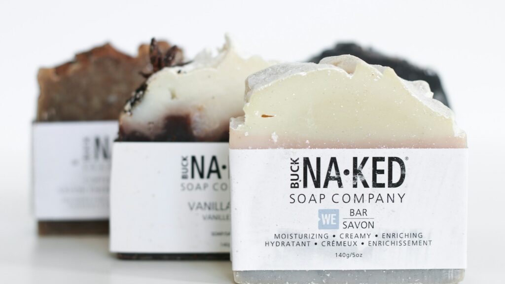 three brown Buck naked soap company