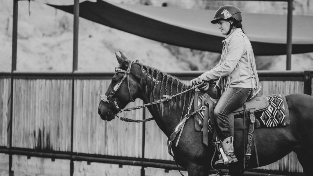 A man riding horse