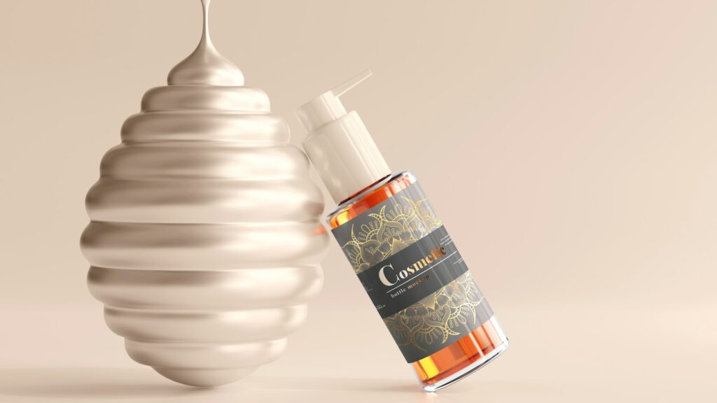 a bottle of liquid sitting next to a white object