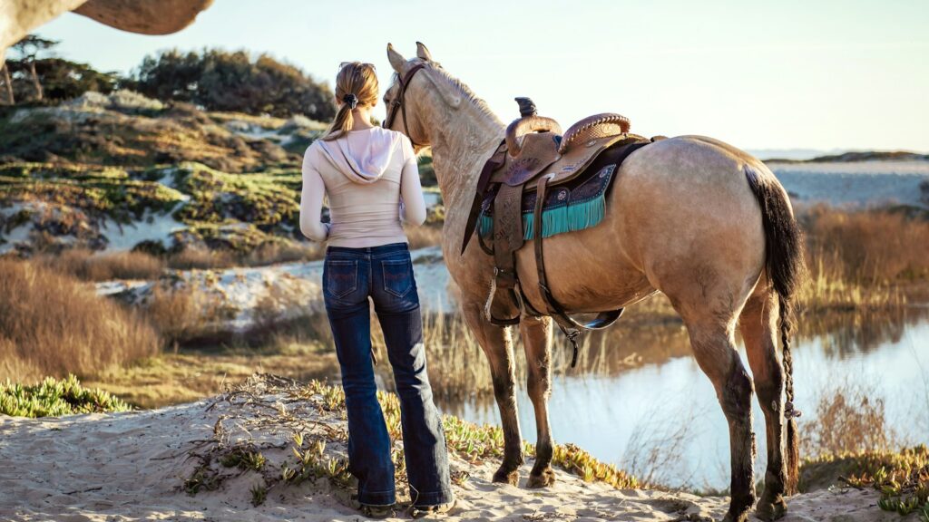 woman near horse