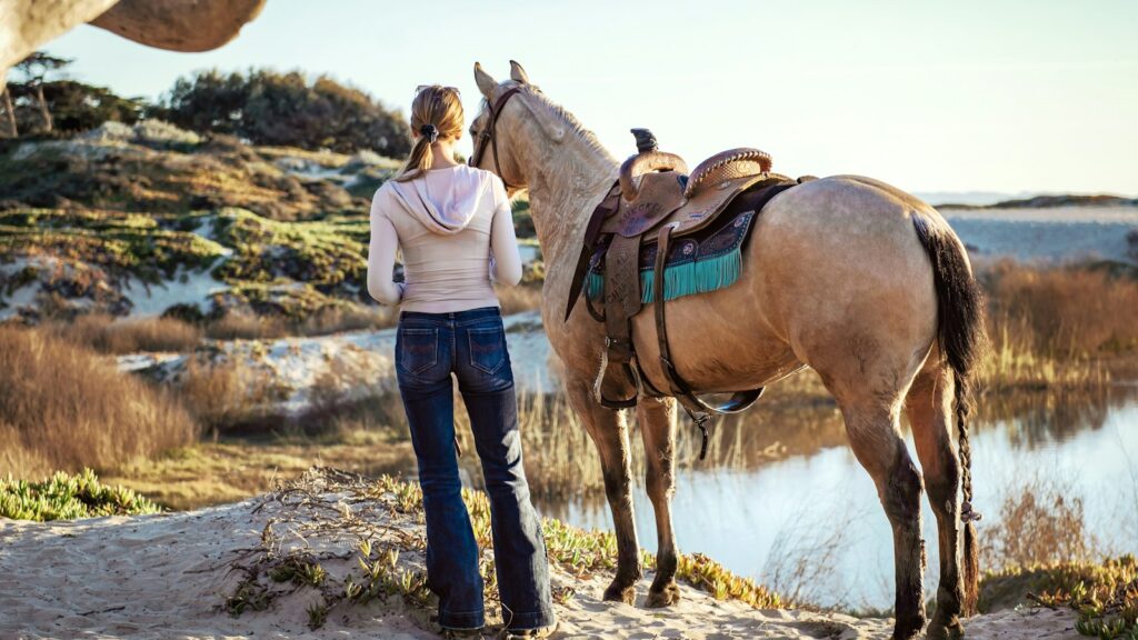 woman near horse