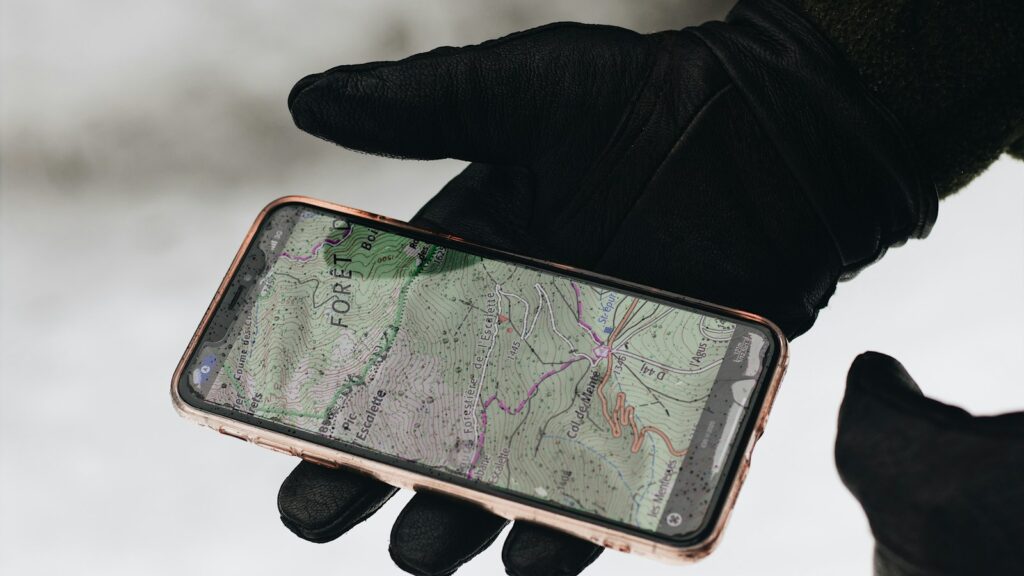 person holding iphone 6 with case