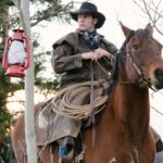 man riding horse