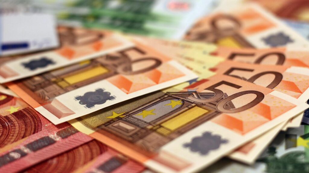 Stack of 50 euro banknotes, representing wealth and finance concepts.