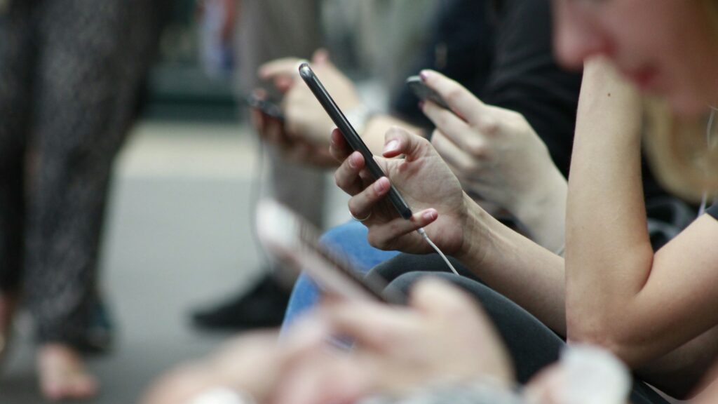 person holding black phone