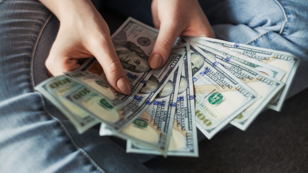 fan of 100 U.S. dollar banknotes
