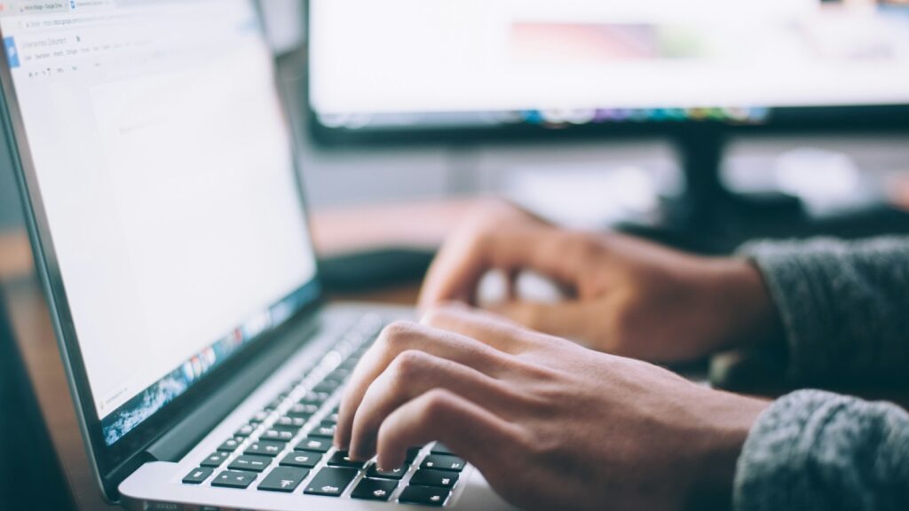 person using MacBook Pro