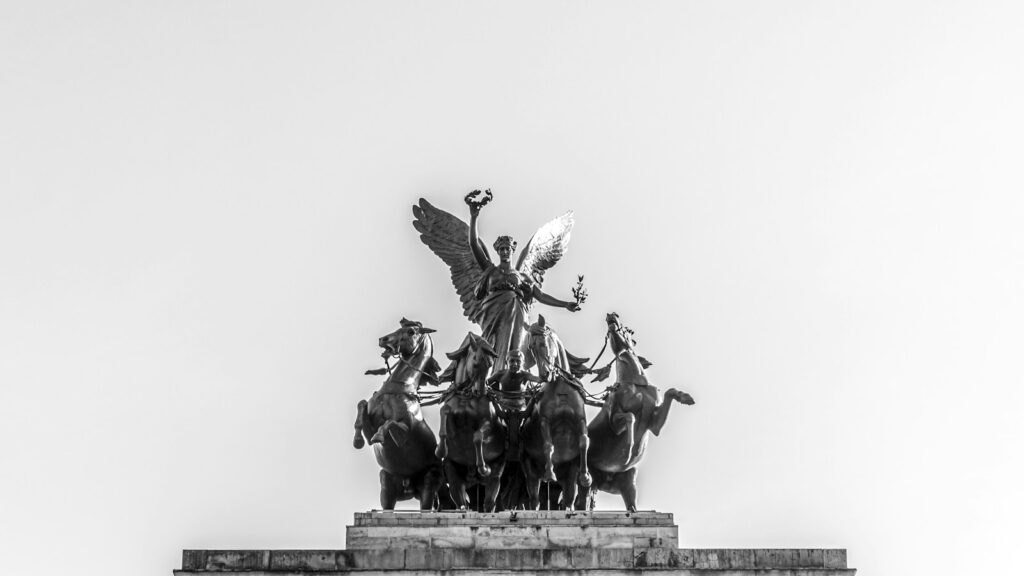 gray concrete statue of man riding horse