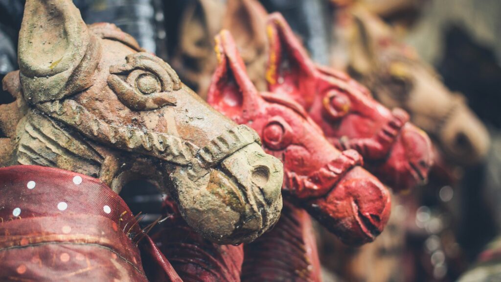 close-up photo of horse statues