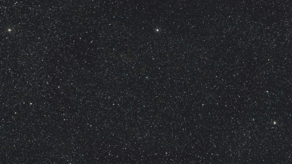 a night sky with a few stars in it