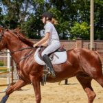 woman riding horse